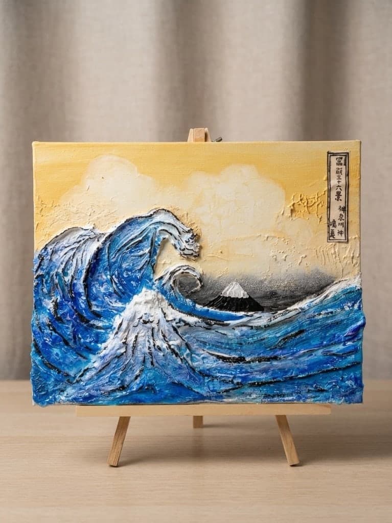 浮世繪作品，畫面上是層次分明的浪與遠山